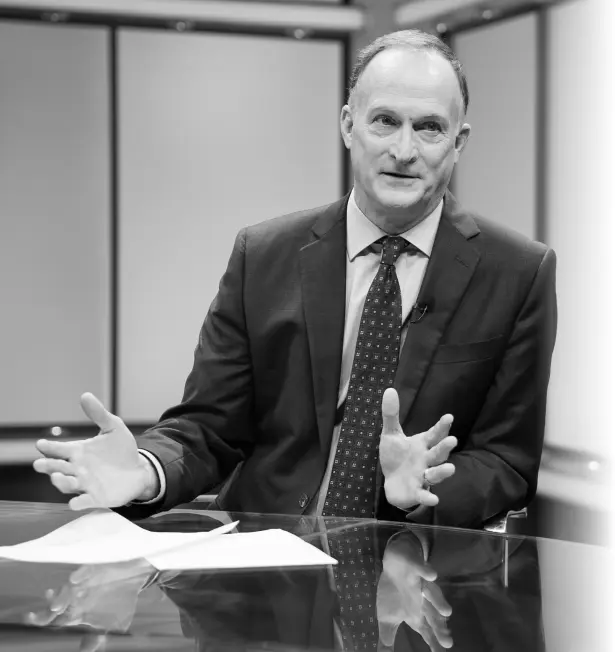 photo of Larry Spoth at a TV newsdesk